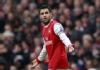 Arsenal down but not out